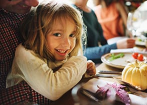 girl at thanksgiving table 1