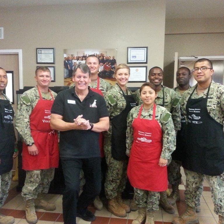 veterans serving dinner